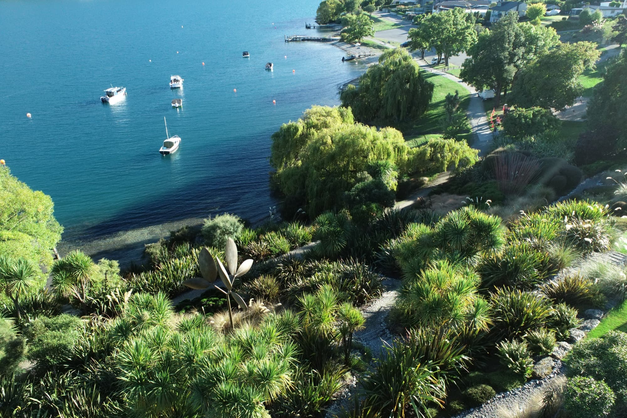 An aerial view of a Diva lakeside garden in the Whakatipu Basin